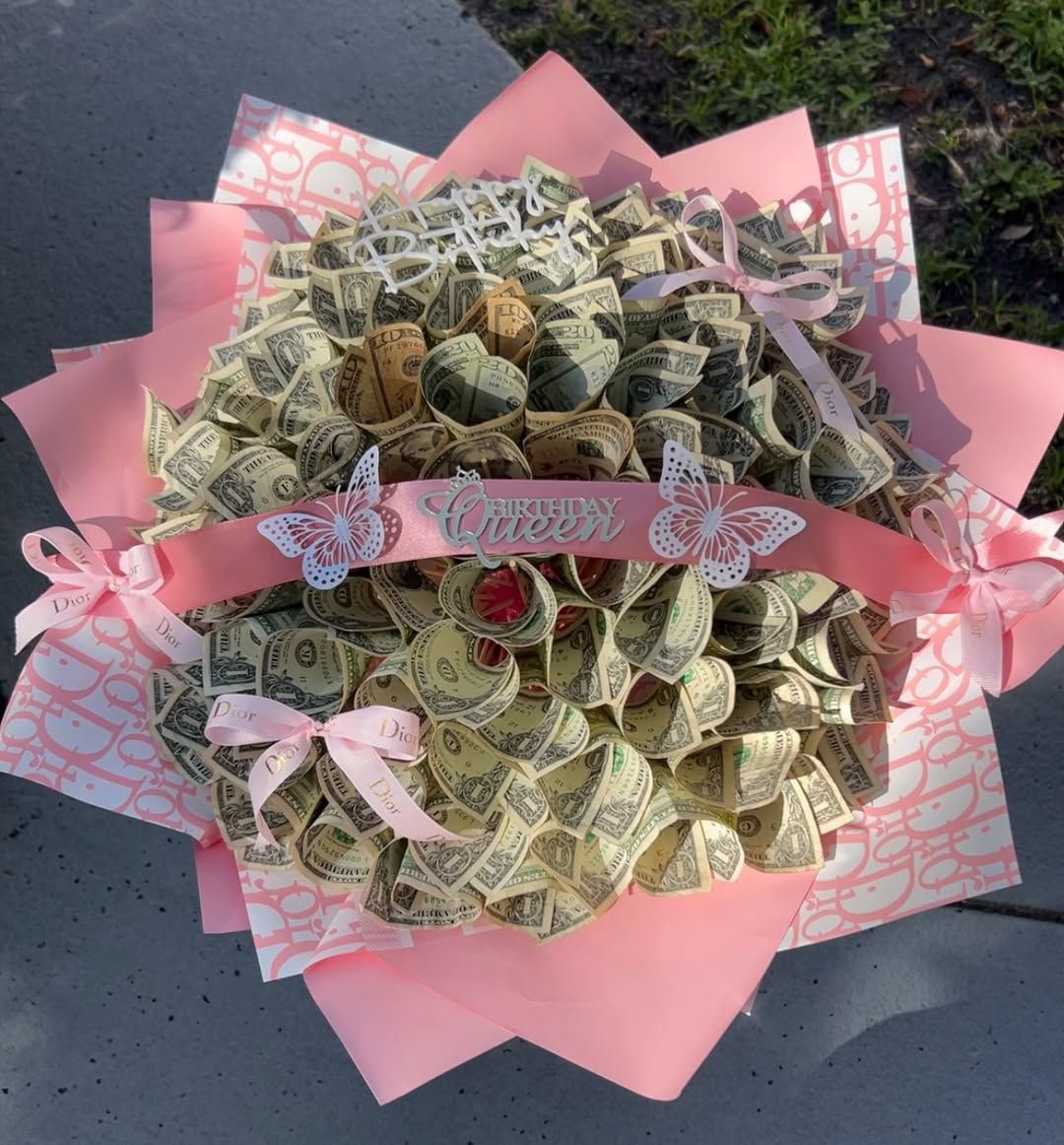 Money bouquet with a Birthday Queen sash, butterflies and pink bows